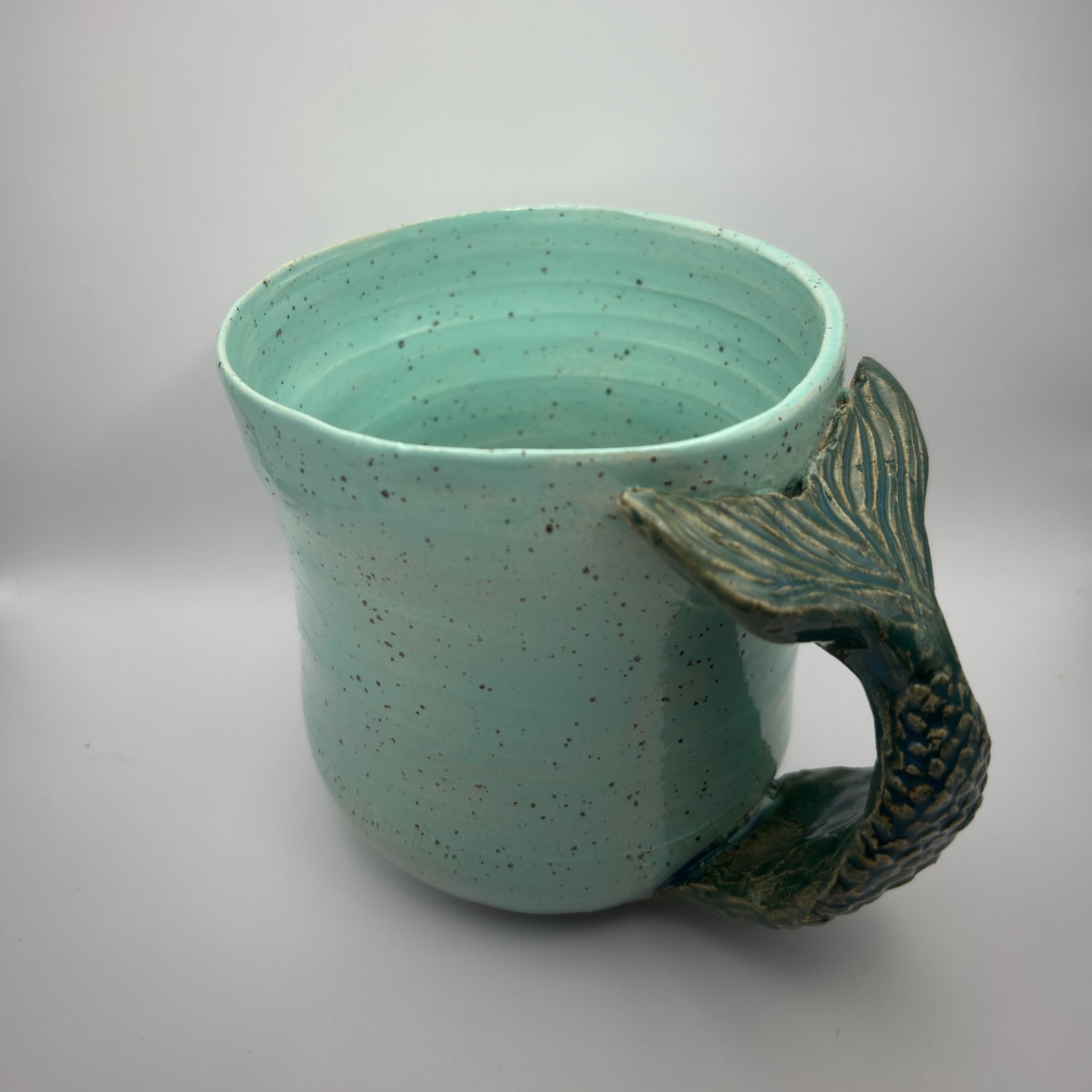 A Handmade Sculptural Mermaid Tail Mug – Seafoam Speckled Glaze by Gin