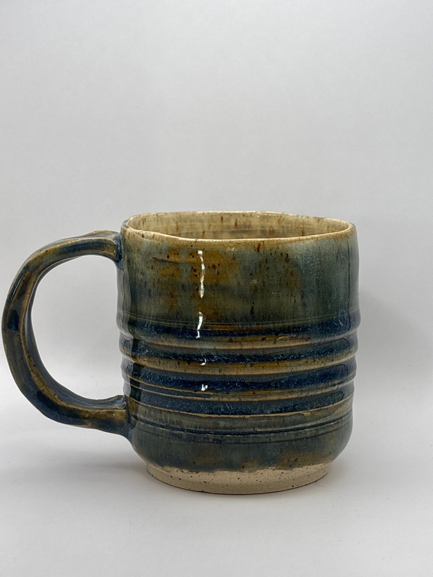 Hand-thrown Ribbed Stoneware Mug in Ocean Blues & Warm Amber by Gin