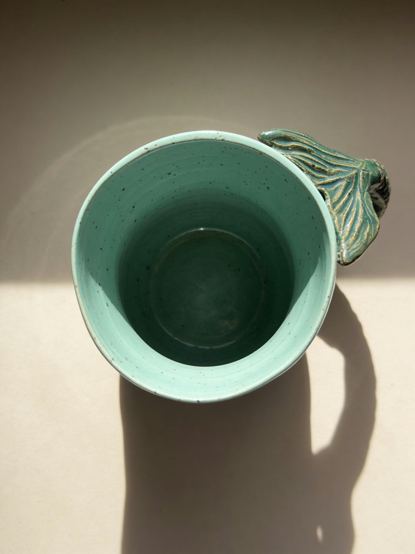 A Handmade Sculptural Mermaid Tail Mug – Seafoam Speckled Glaze by Gin