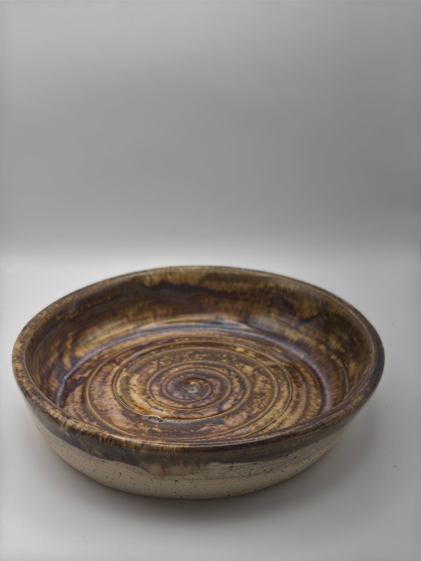 Hand-Thrown Shallow Stoneware Bowl in Swirling Earth Glaze by Gin
