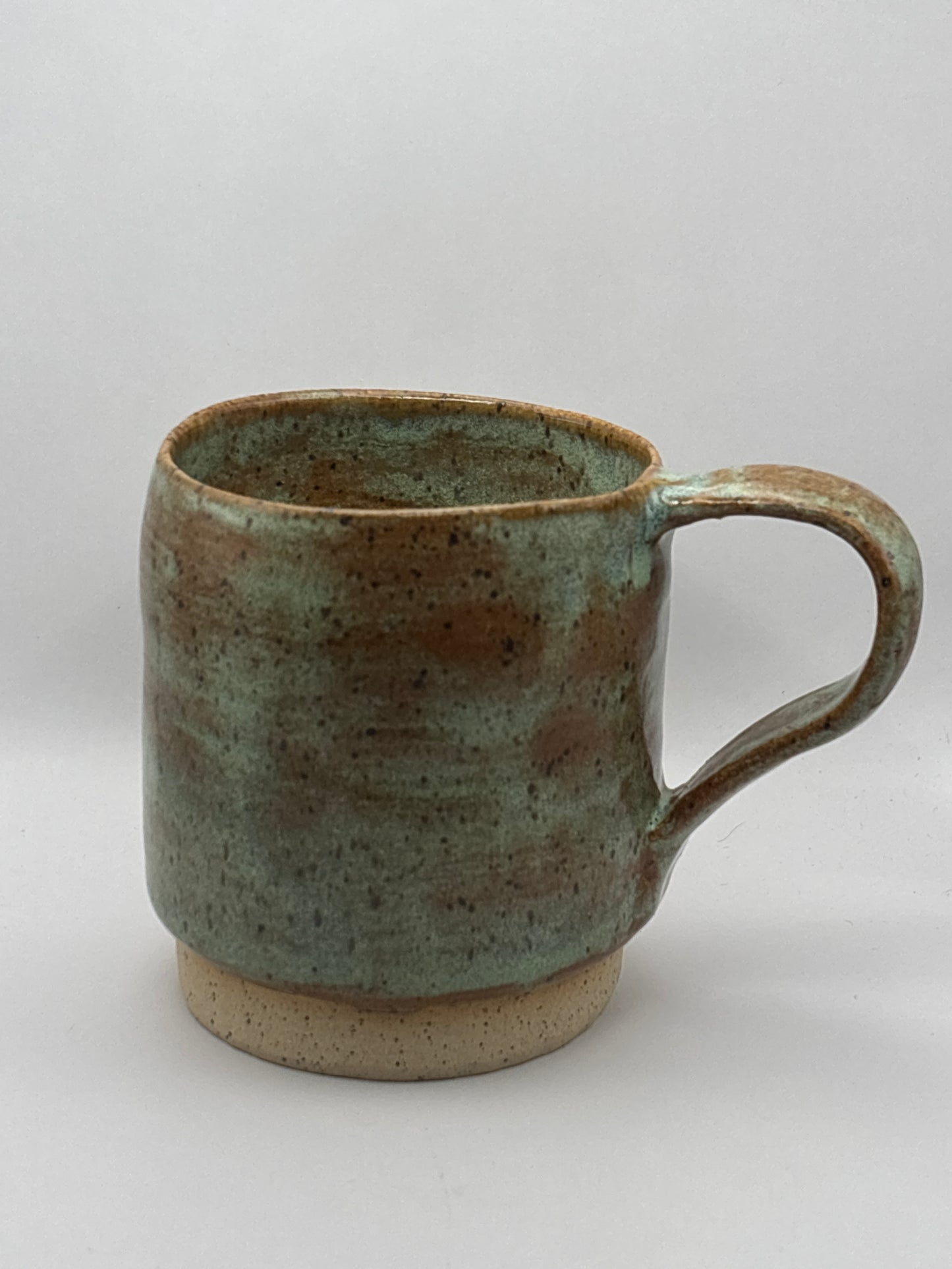 Handmade Speckled Stoneware Mug in Soft Teal and Earthy Browns by Gin